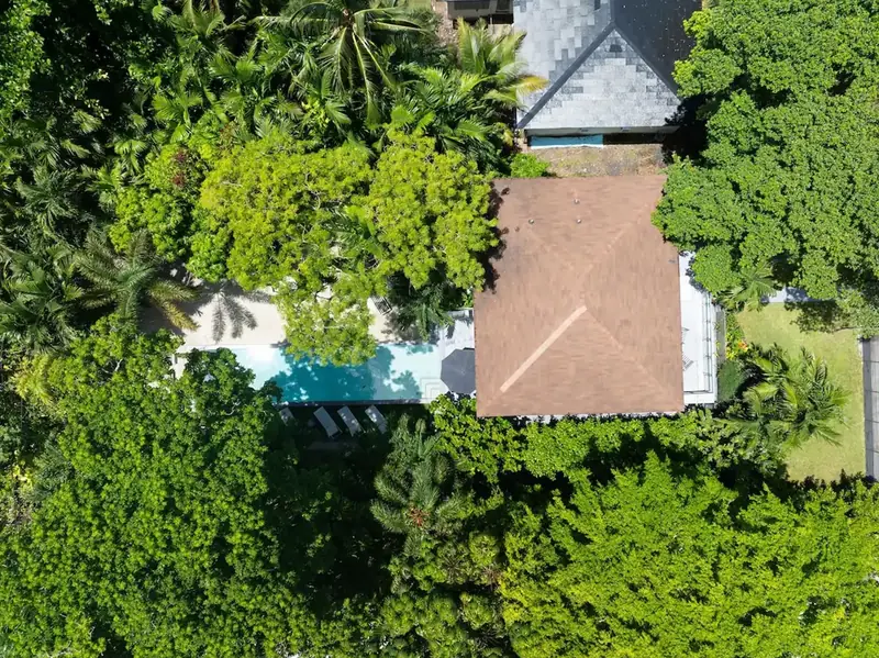 Aerial view of The Waterhouse among tropical trees